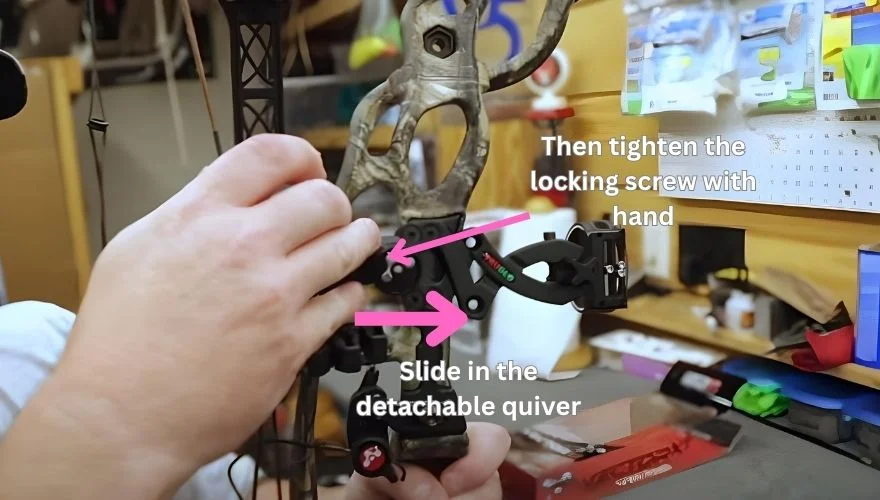 sliding the detachable quiver into the bracket